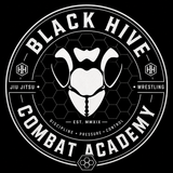 Black Hive Combat Academy MMA logo with white bee and hexagonal design on black background