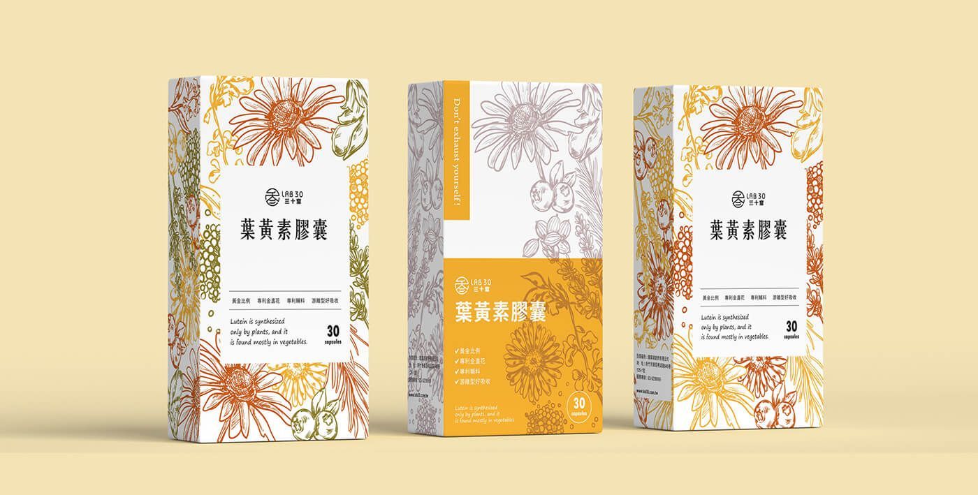 Three boxes of tea are sitting next to each other on a table.