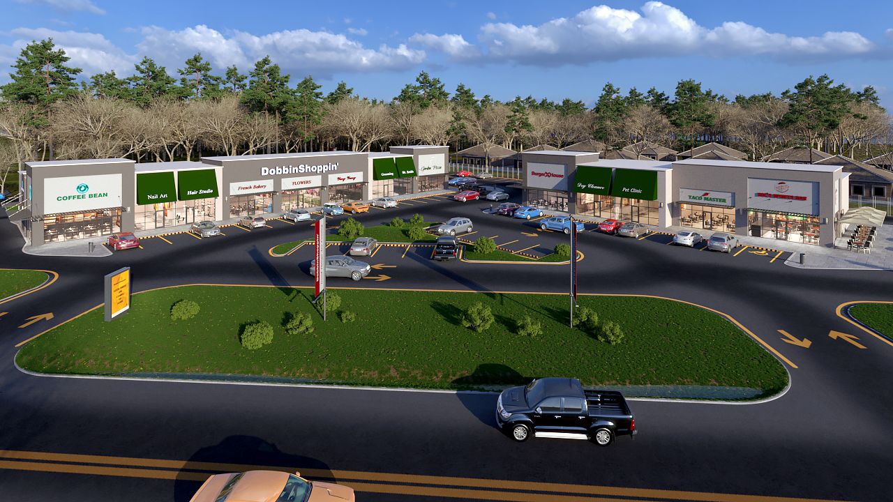 An artist 's impression of a shopping center with cars parked in front of it