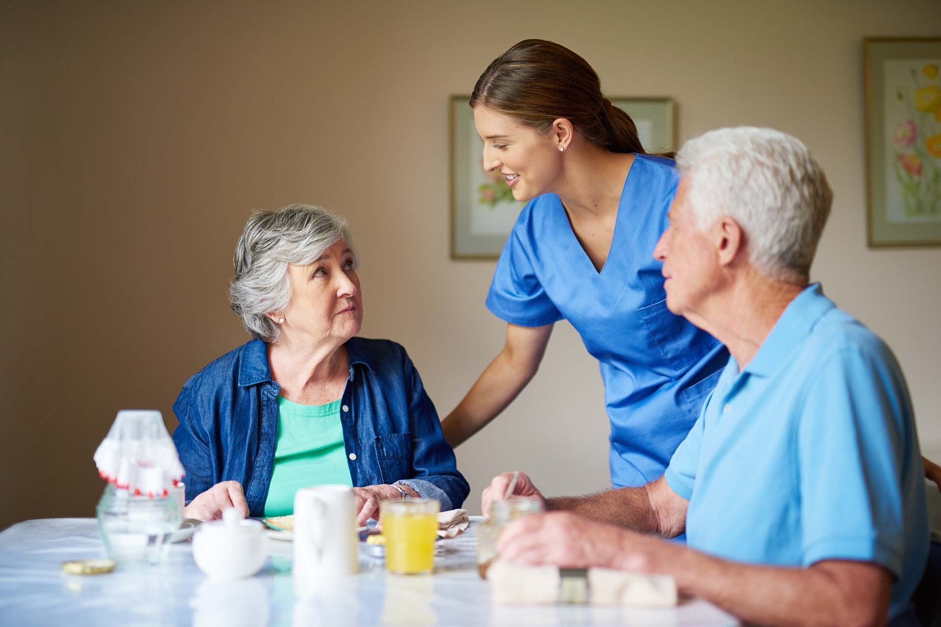 Nurse caring for elderly man. Nurse caring for elderly man.