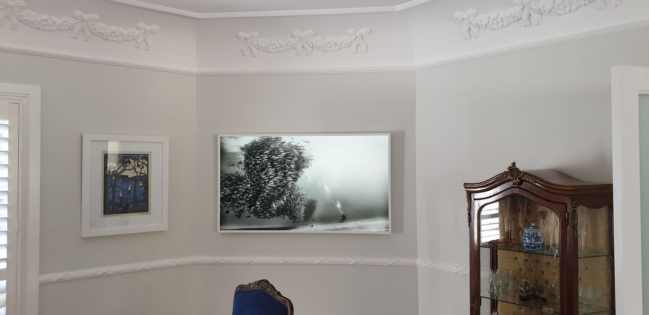 TV on a wall. 