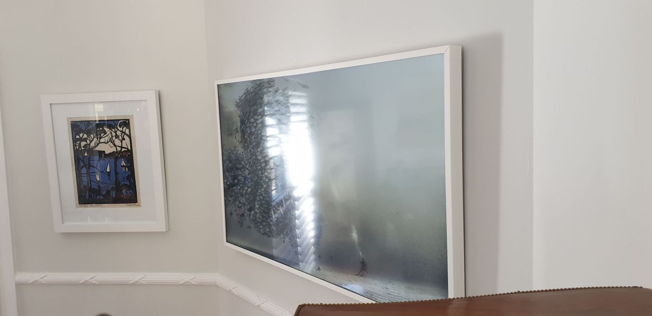 TV on a wall. 