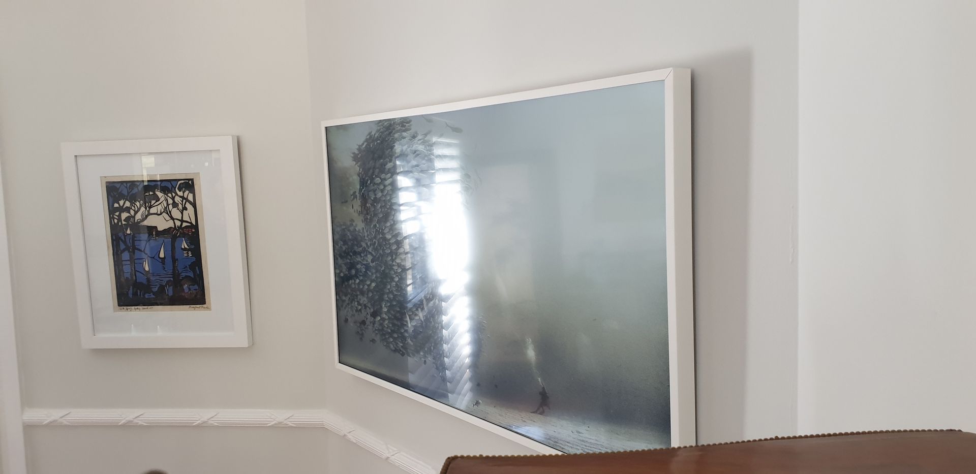 TV on a wall.