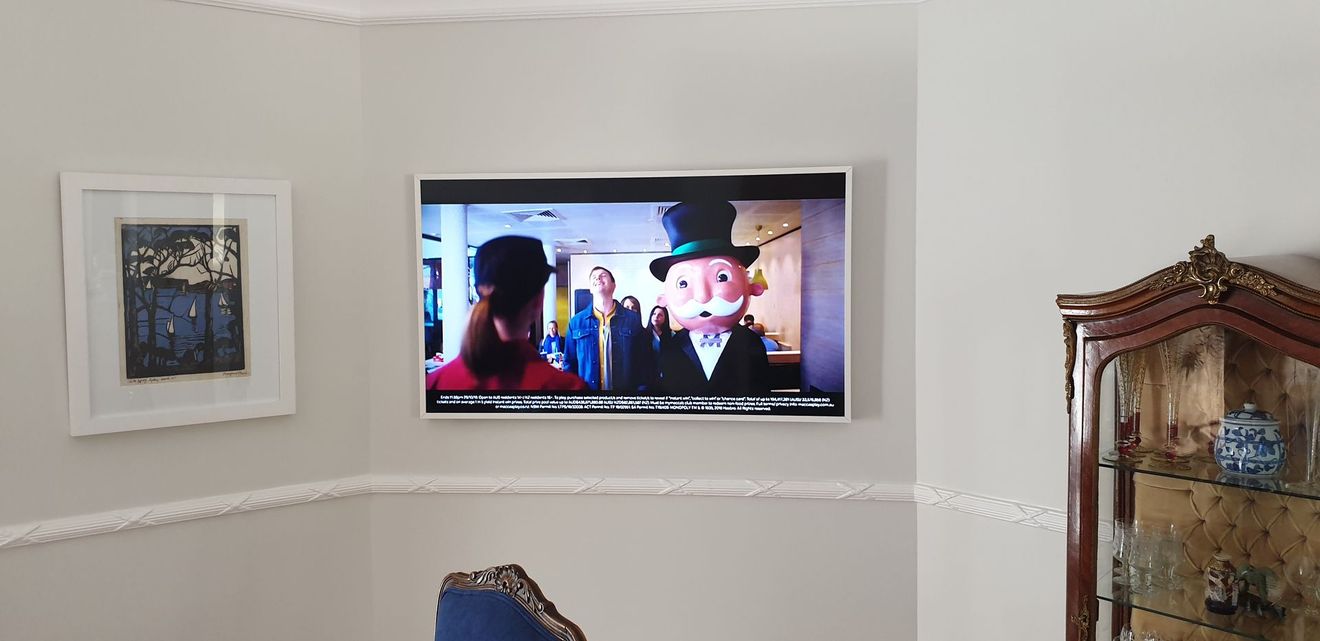 TV on a wall. 