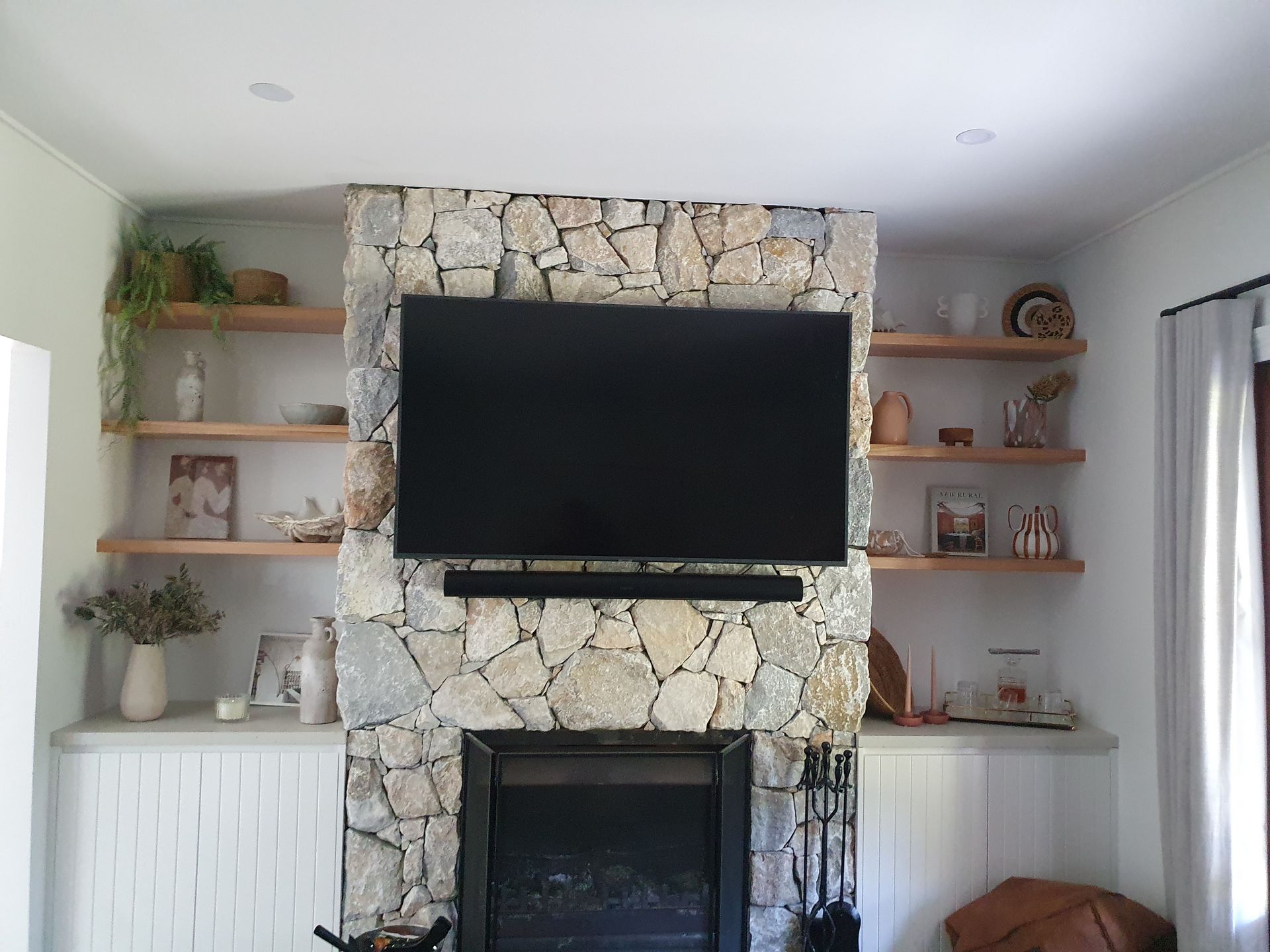 TV on a wall.