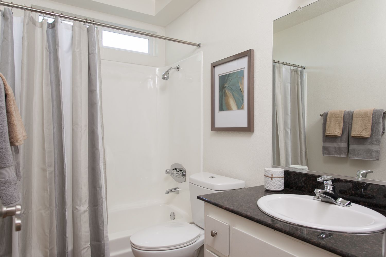 Apartment bathroom with full tub