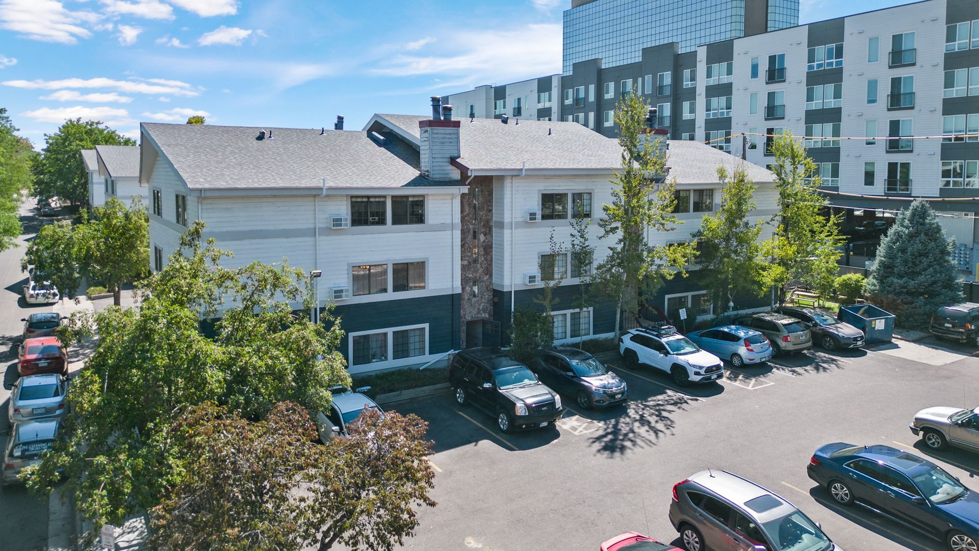 Building photo showing the parking lot in the foreground