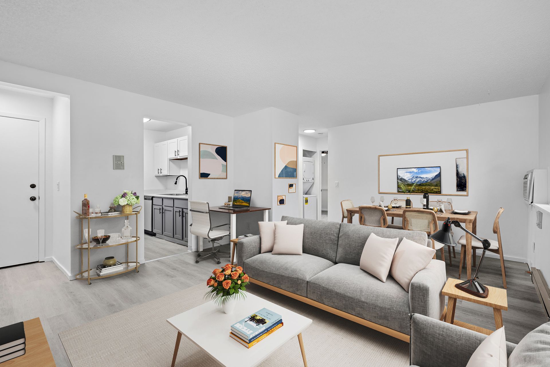 Photo showing a large living room space with plenty of open room