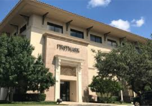 Two-story beige building with 