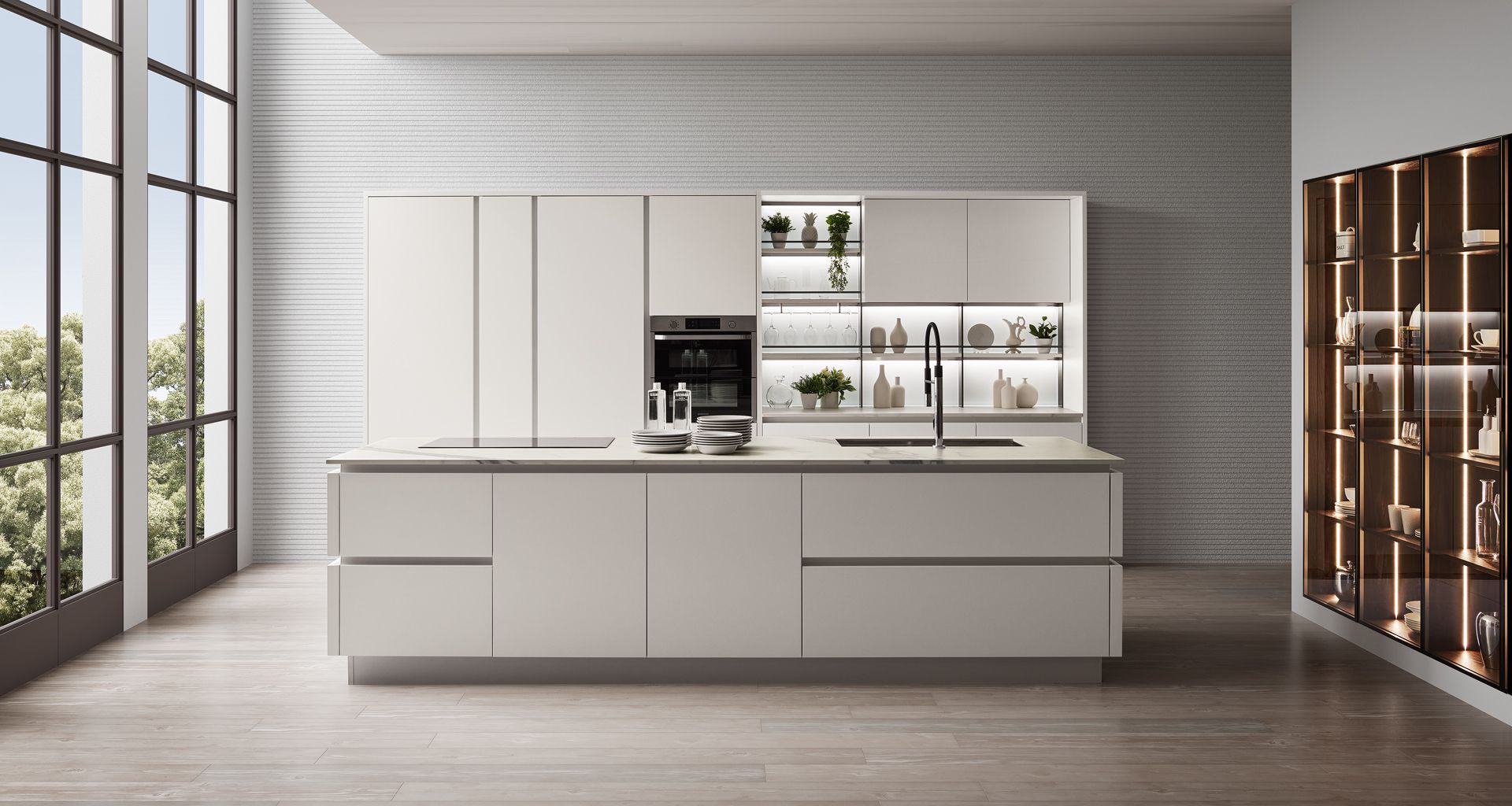 Cucina moderna e minimalista con mobili e isola dai colori chiari. 