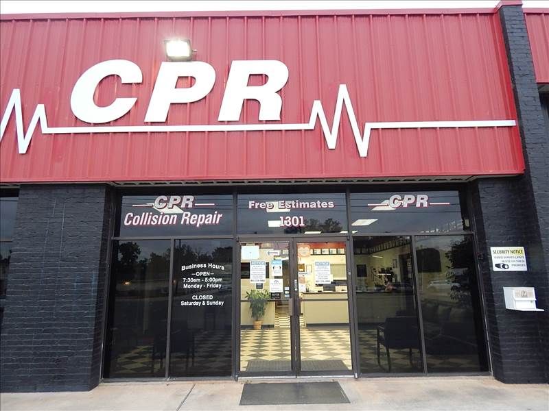 CPR Collision Repair building entrance with red and black exterior.