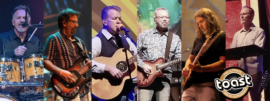 Band Toast performing on stage with several musicians.