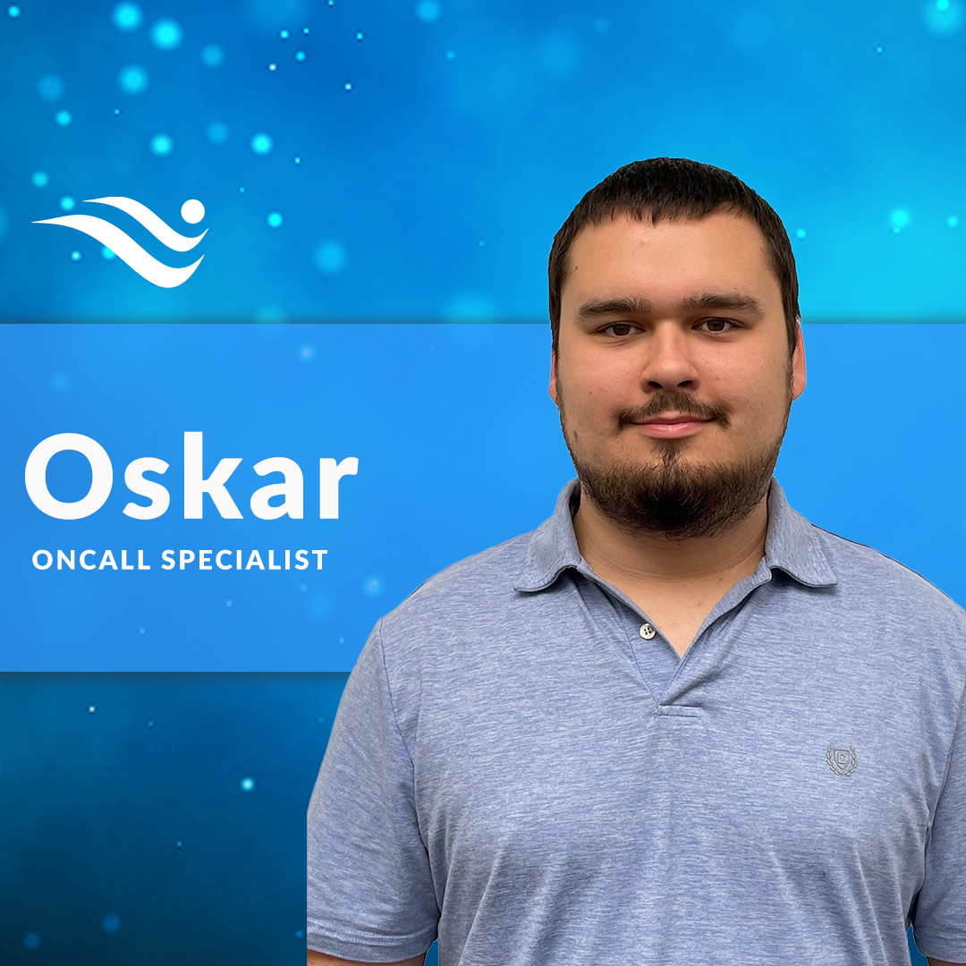 Oskar, Oncall Specialist, standing before a blue branded background
