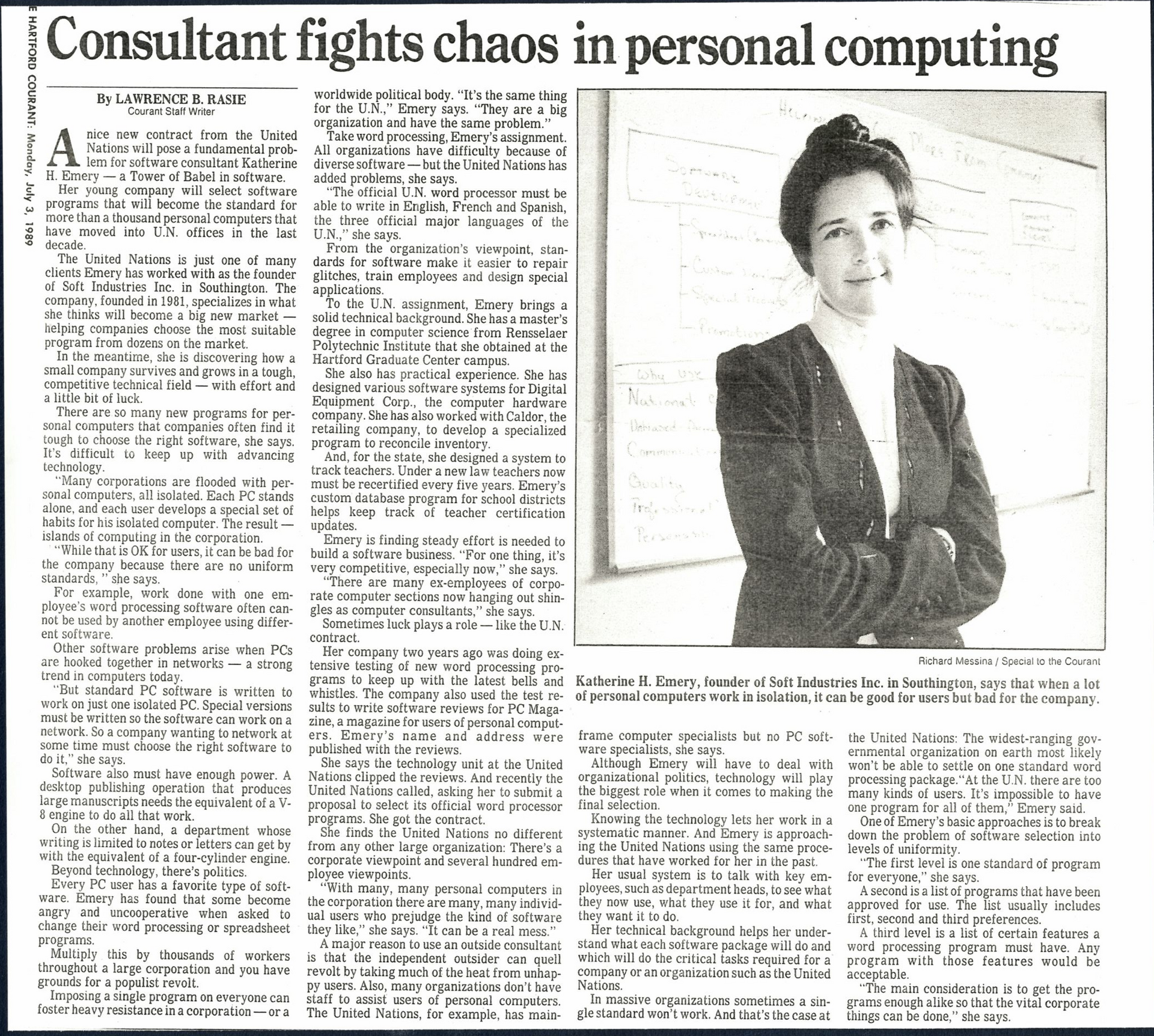 News article text with photo of woman in tech with dark blazer and hair pulled up in bun with arms crossed.
