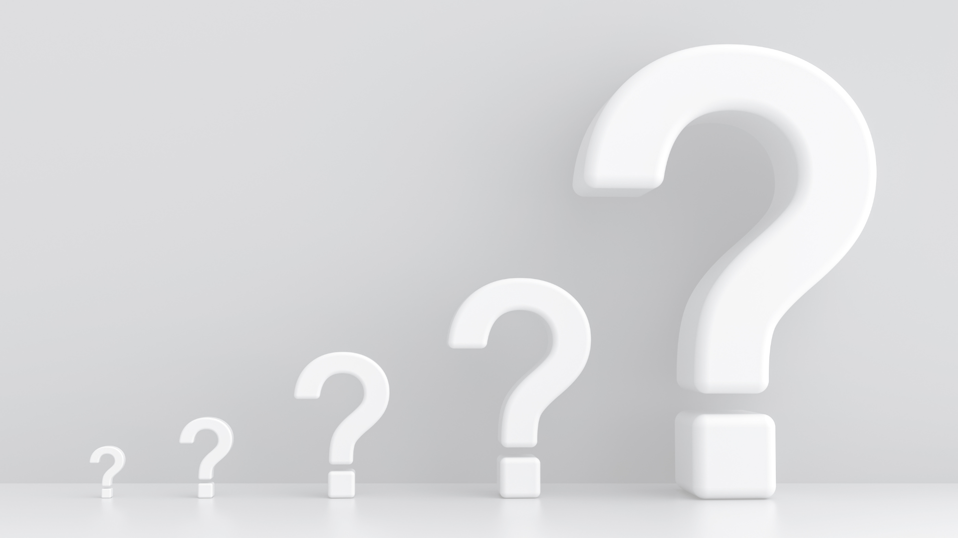 White question marks of increasing size, arranged in a row against a light background.