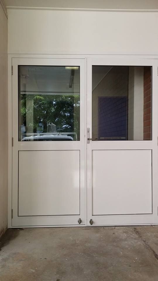 White Double Doors With Glass Panels — Innisfail Glass & Aluminium in Innisfail, QLD