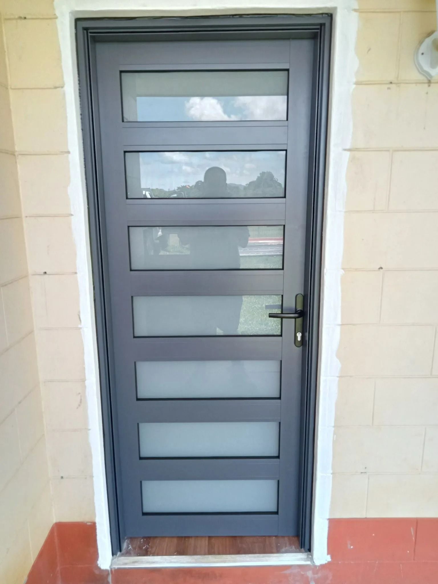 Gray Door With Six Frosted Glass Panels — Innisfail Glass & Aluminium in Innisfail, QLD