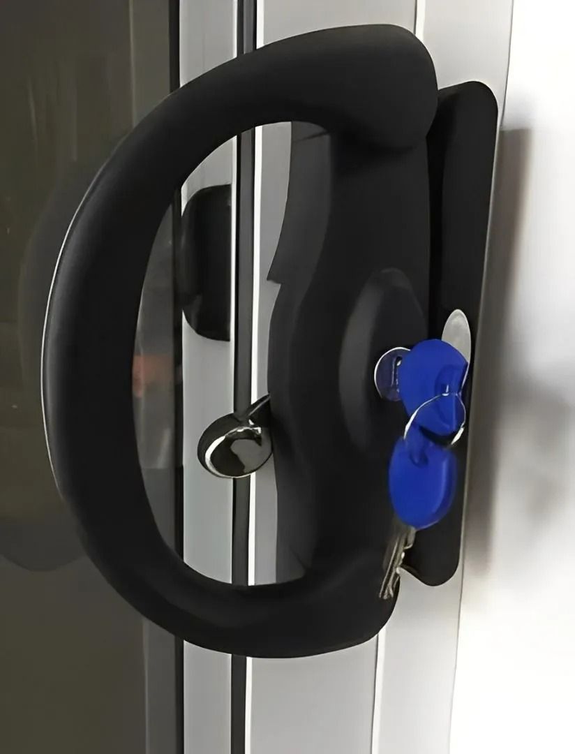 Black Door Handle With Two Blue Keys Inserted — Innisfail Glass & Aluminium in Innisfail, QLD