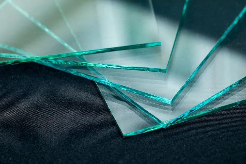 Stack of Clear Glass Sheets, Showing Slight Green Edges — Innisfail Glass & Aluminium in Innisfail, QLD