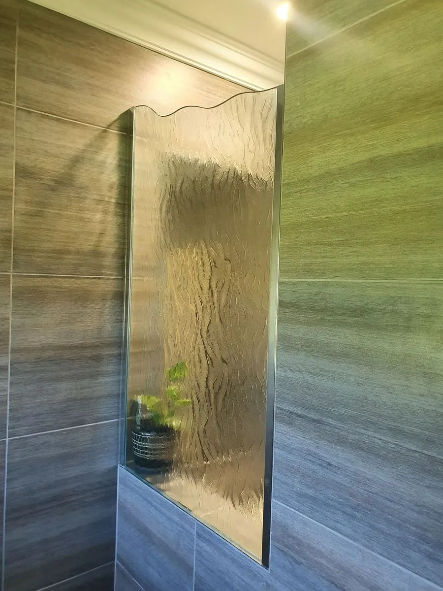 Shower With Wavy Glass Divider and Tiled Walls — Innisfail Glass & Aluminium in Innisfail, QLD