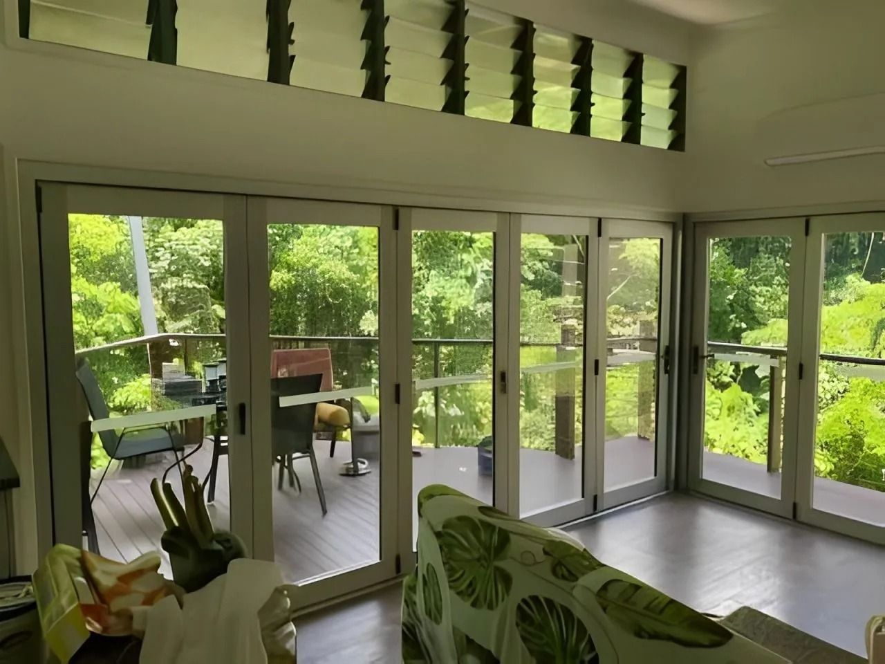 Living Room With Large Sliding Glass Doors — Innisfail Glass & Aluminium in Innisfail, QLD