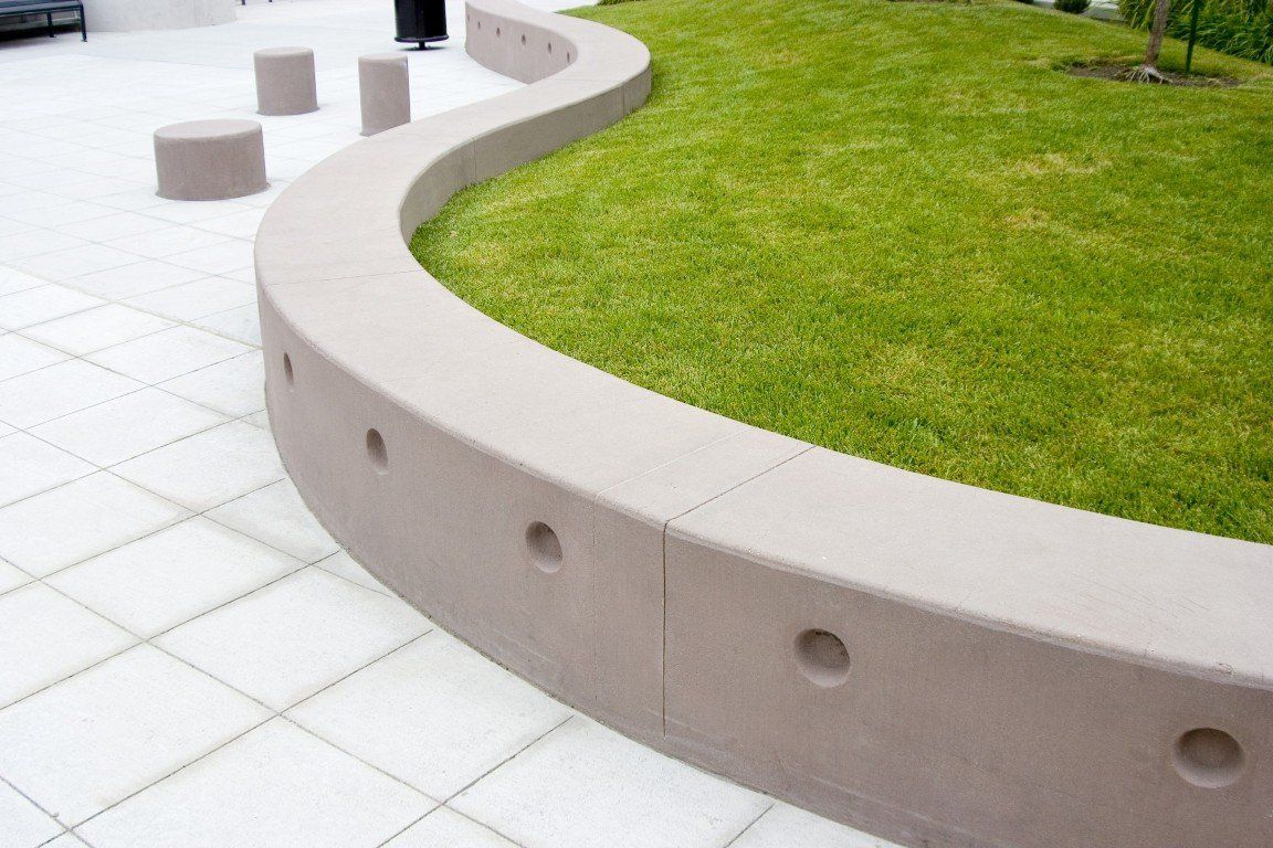 Modern concrete retaining wall freshly built for a local council yard in Mandurah WA.