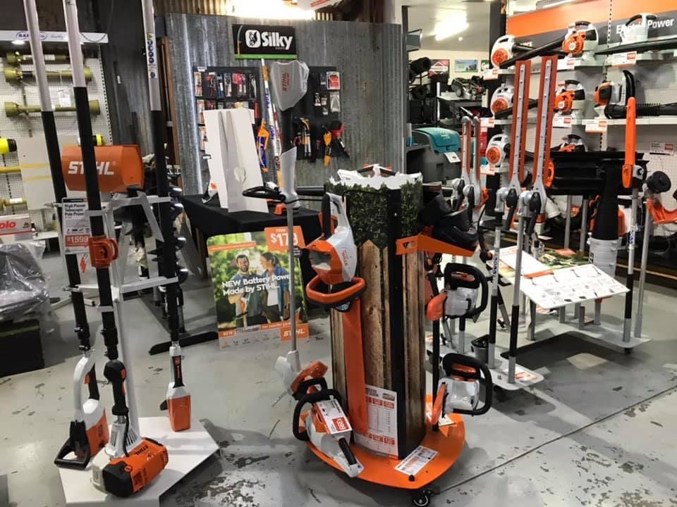 Orange and Black Stihl Chainsaws and Power Tools Displayed in a Store Aisle — Casali's in Mareeba, QLD