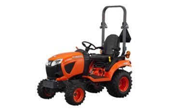 Orange Compact Tractor With Black Roll Bar and Large Tires on a White Background — Casali's in Mareeba, QLD