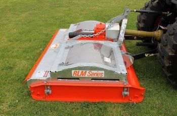 Orange Rlm Senos Mower Attachment on Grass, Hitched to a Tractor on the Right — Casali's in Mareeba, QLD