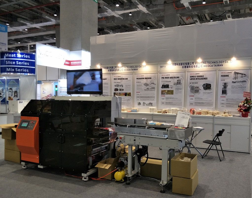 A large machine is sitting in the middle of a room.