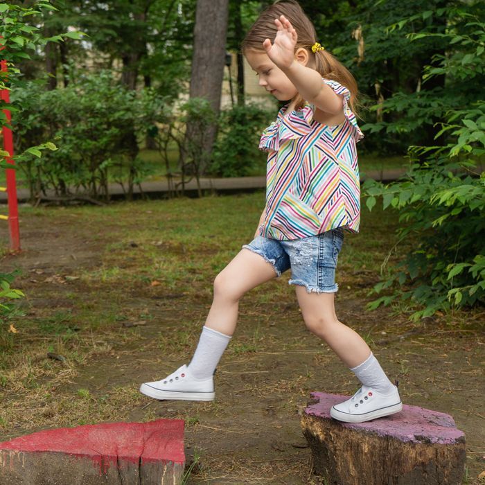 Little Girl Playing in Nature — East Perth, WA — It Takes A Village Family Day Care Service