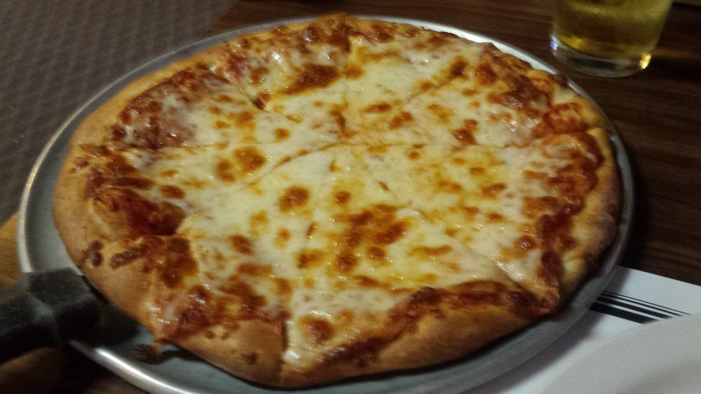 Delicious Pizza — Anchorage, AK — Guido's Pizza