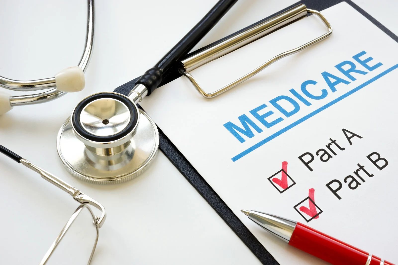 Medicare form with stethoscope, Part A and Part B checked