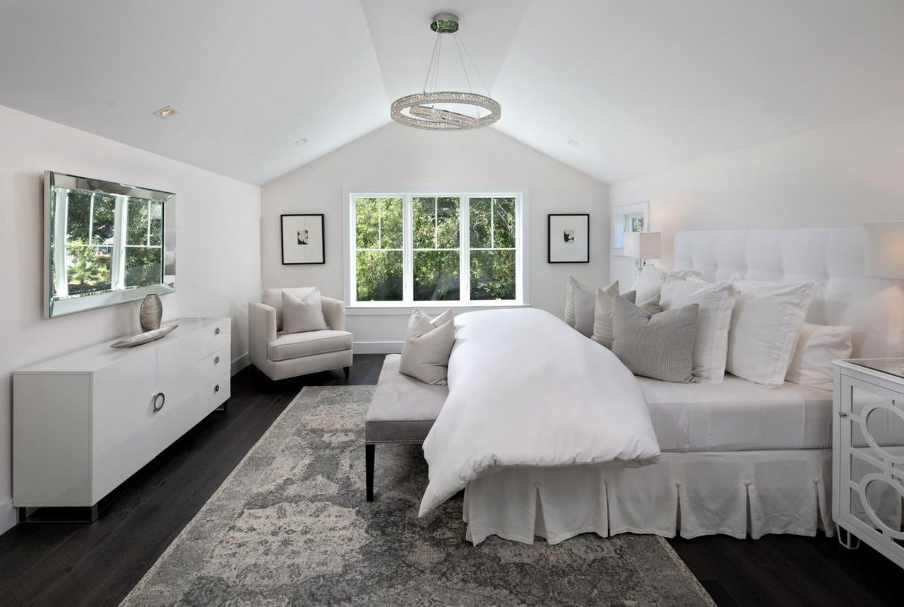 There is a large bed in the middle of the room.