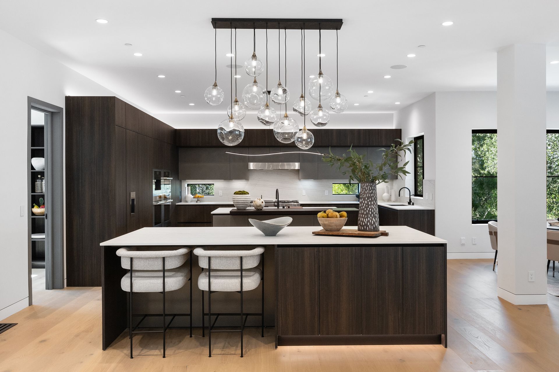 There is a large island in the middle of the kitchen.