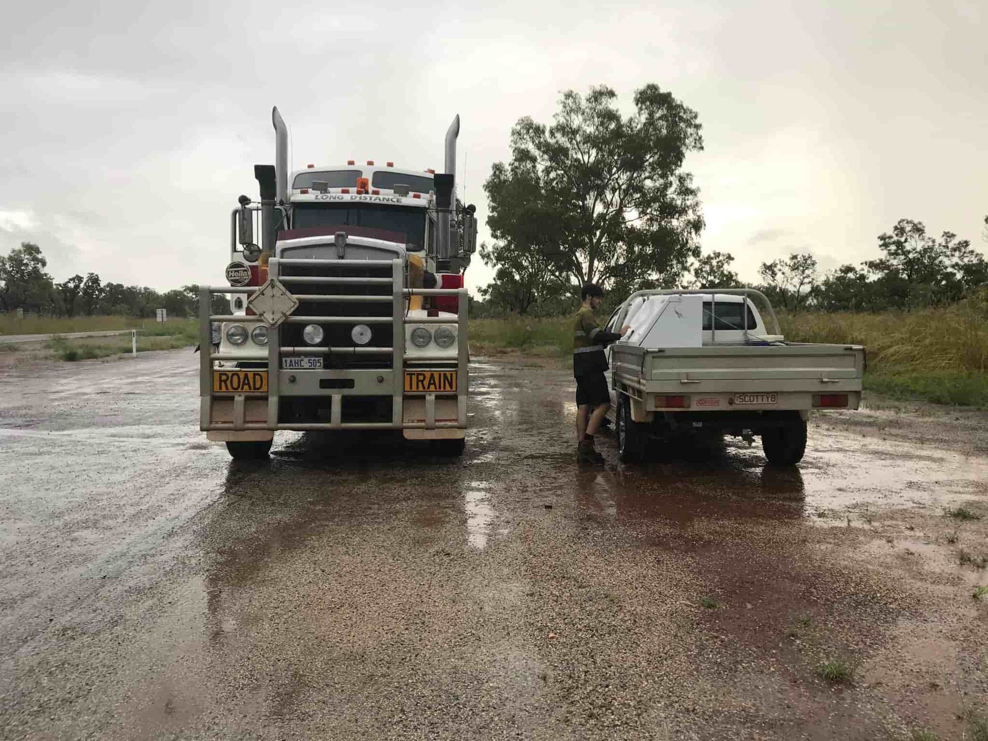 Two Trucks Are Parked Next to Each Other on a Wet Road — All things Diesel NT in Tivendale, NT 