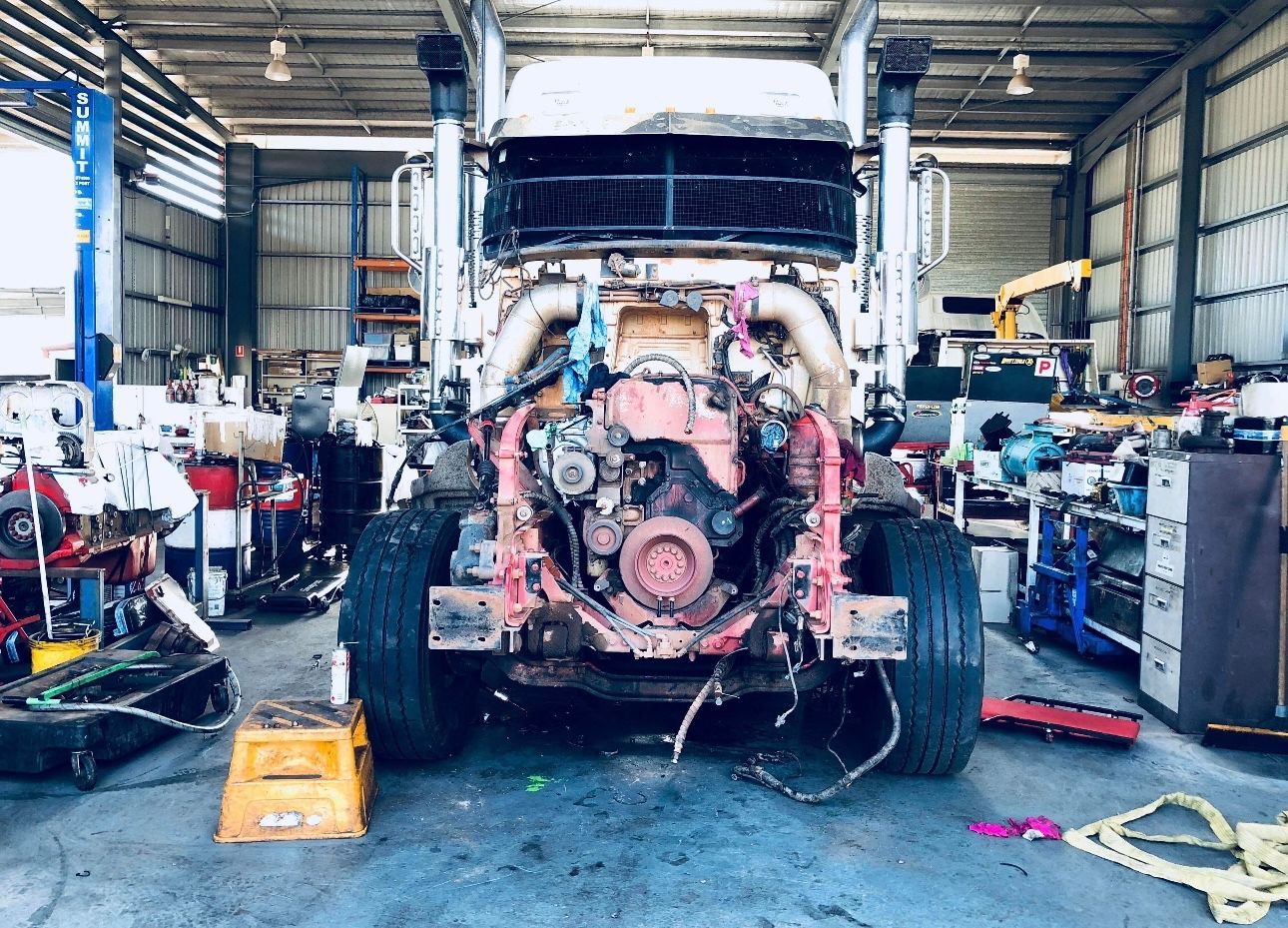 A truck in a workshop with a diesel engine being repaired — All things Diesel NT in Palmerston, NT