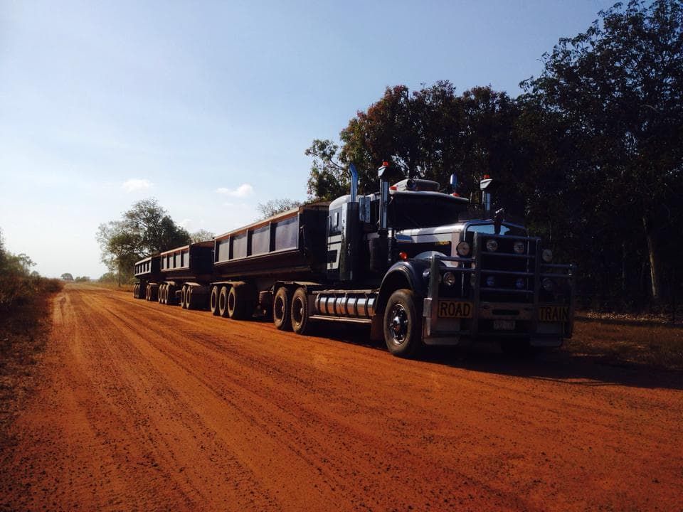 A Large Truck is Driving Down a Dirt Road — All things Diesel NT in Tivendale, NT