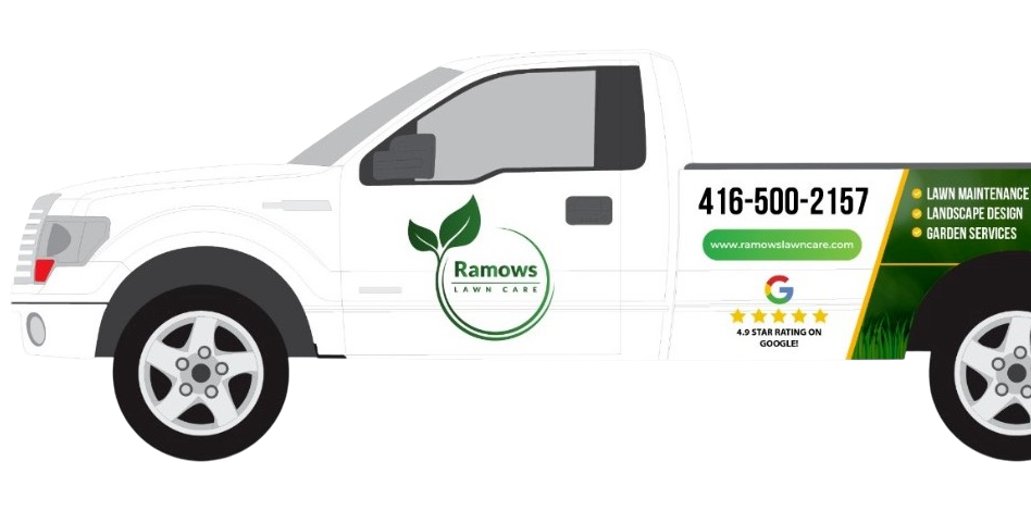 A white truck with a green logo on the side of it.