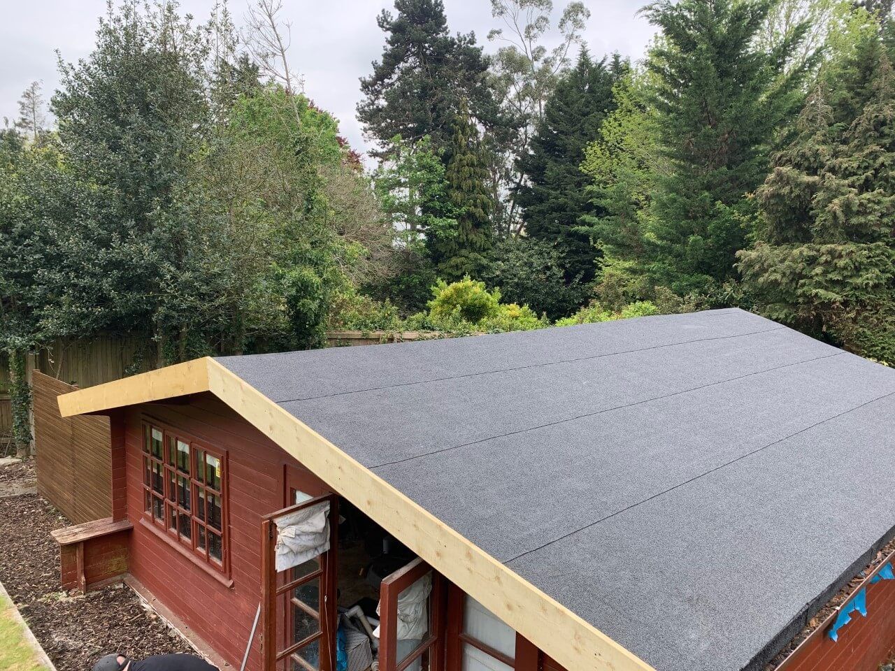 Grey Flat Roofing on shed by Leatherhead Roofers HDN Roofing