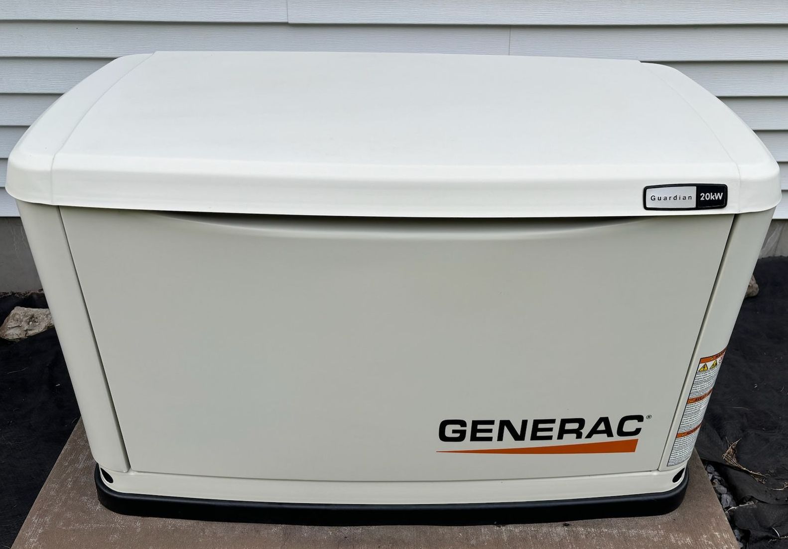 white generator beside the building