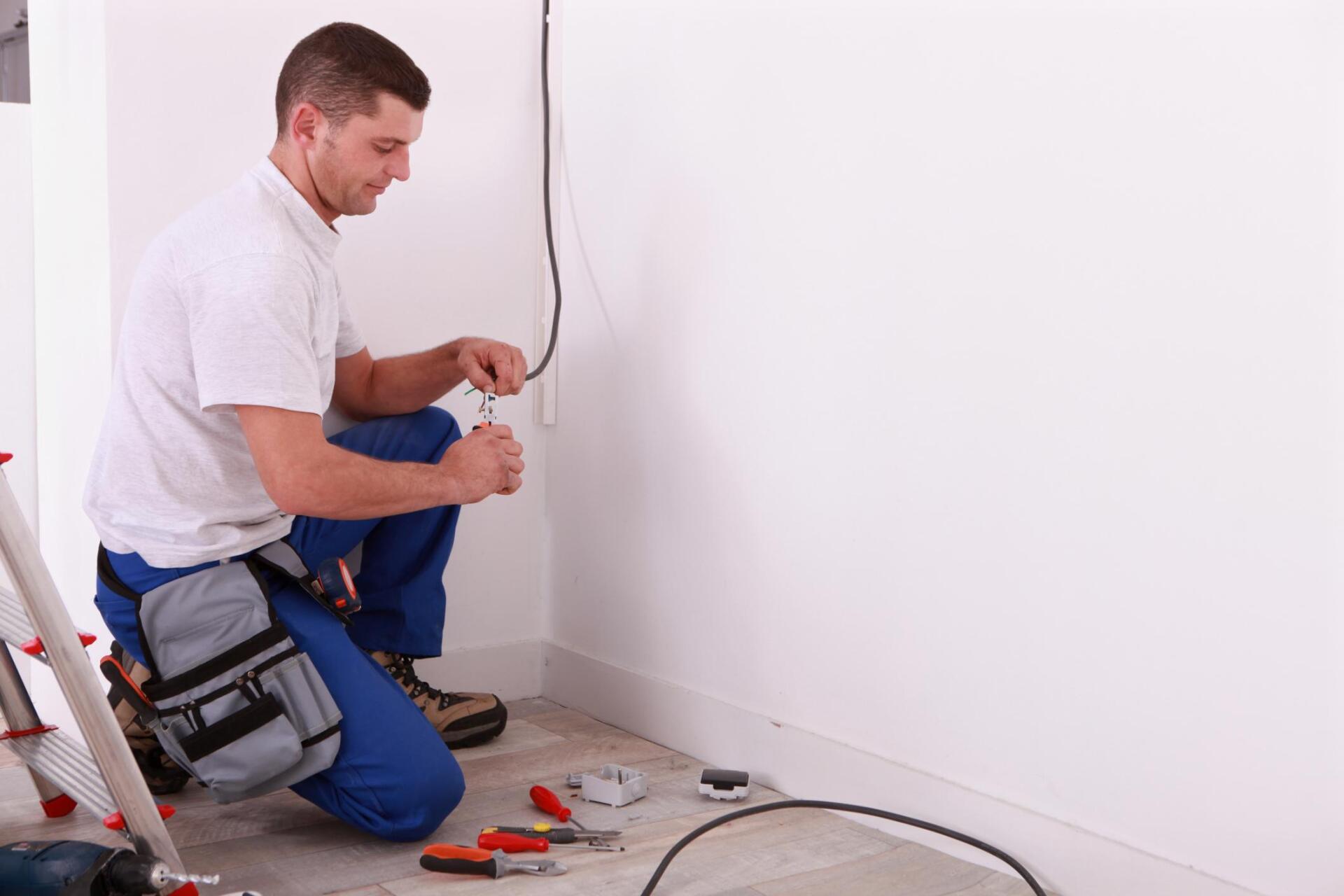 worker cutting the wire