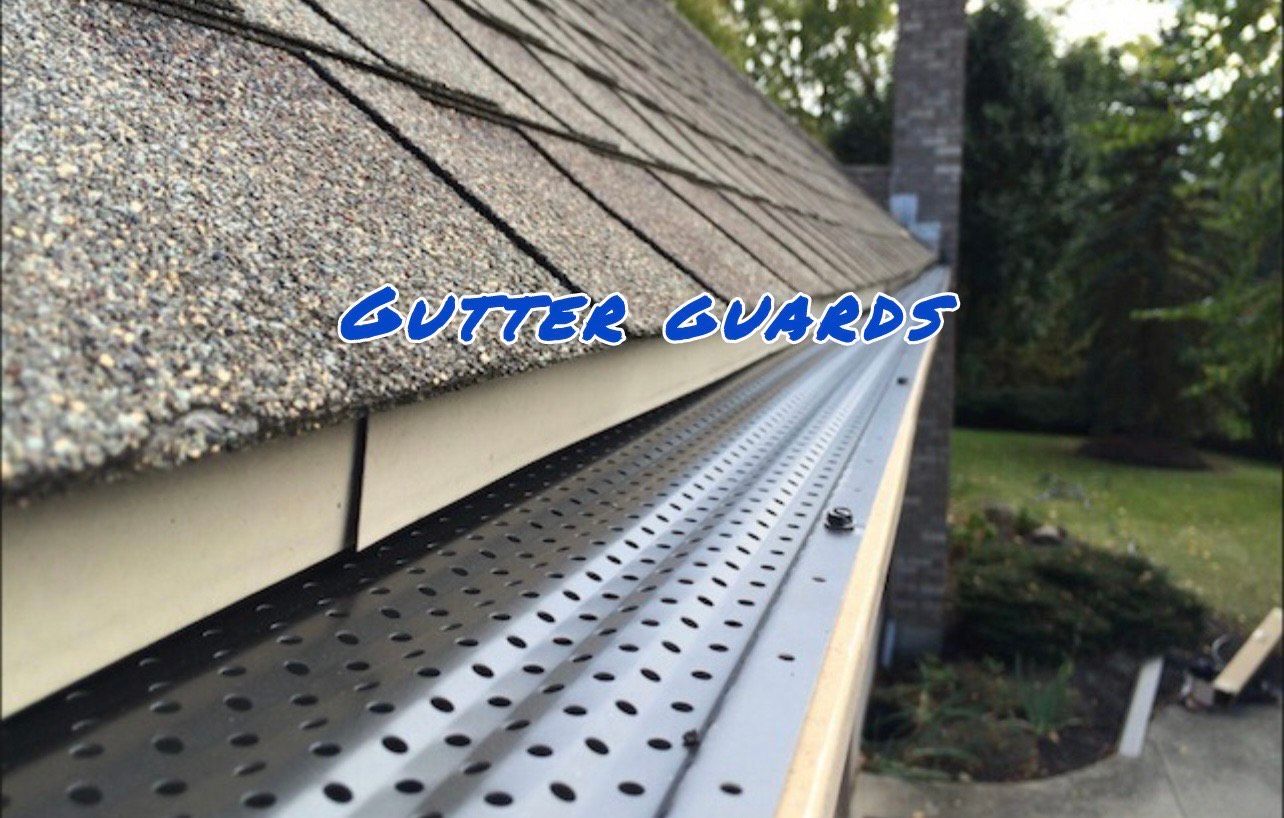 Gutter guards installed on a roof, protecting against debris.