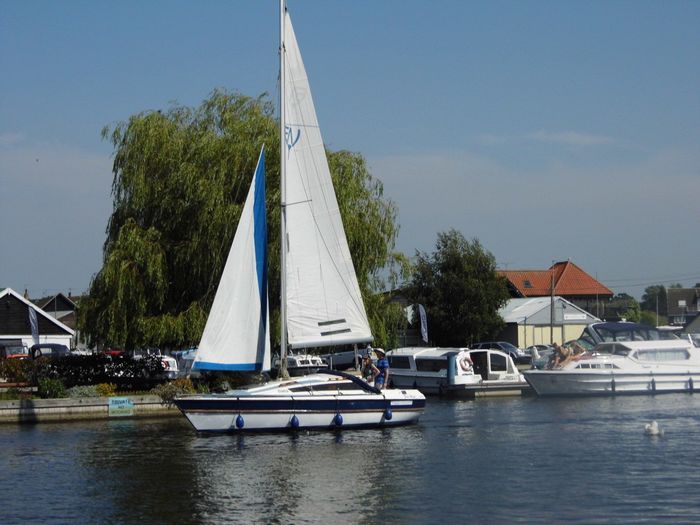 Sailing yacht on  River Bure, Norfolk Broads.