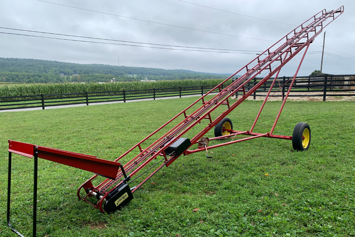 Stoltzfus Manufacturing hay elevator for lifting square hay bales to upper barn levels.