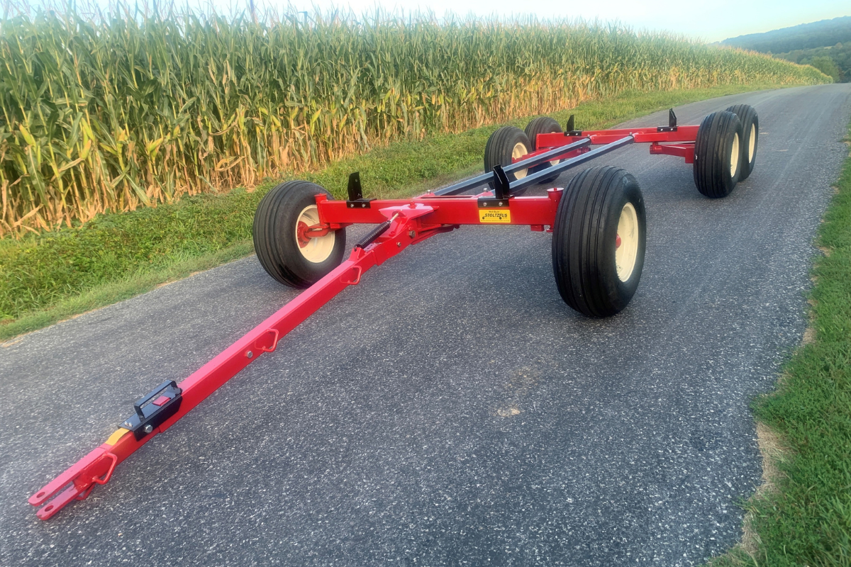 Tandem axle running gear built by Stoltzfus Manufacturing for agricultural wagons and farm use.