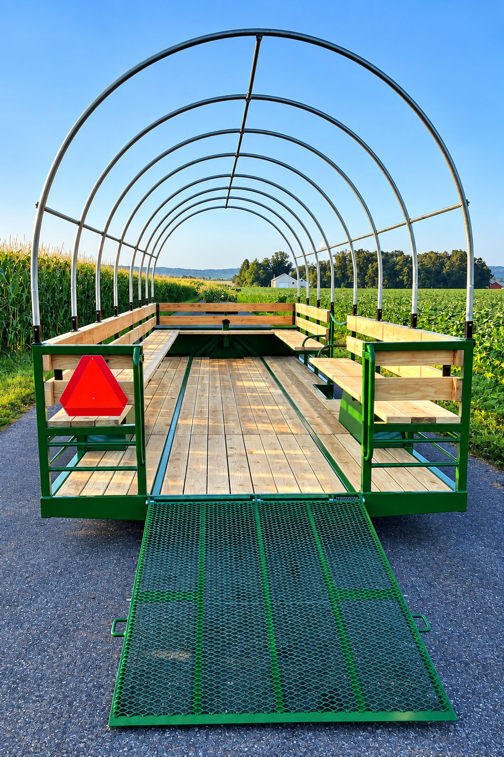 Accessible hayride wagon with wheelchair ramp and perimeter bench seating by Stoltzfus Manufacturing