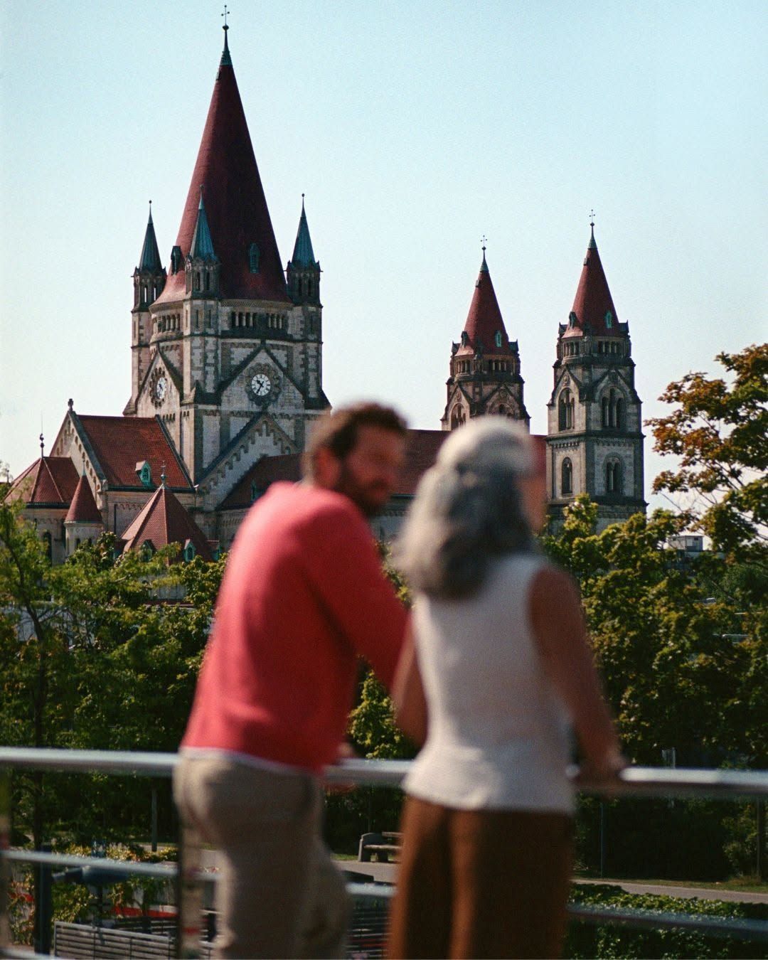 Couple on a romantic international travel getaway near a historic cathedral