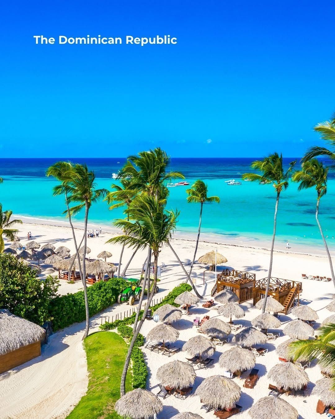 Hawaiian beach with volcanic landscape and clear blue Pacific water