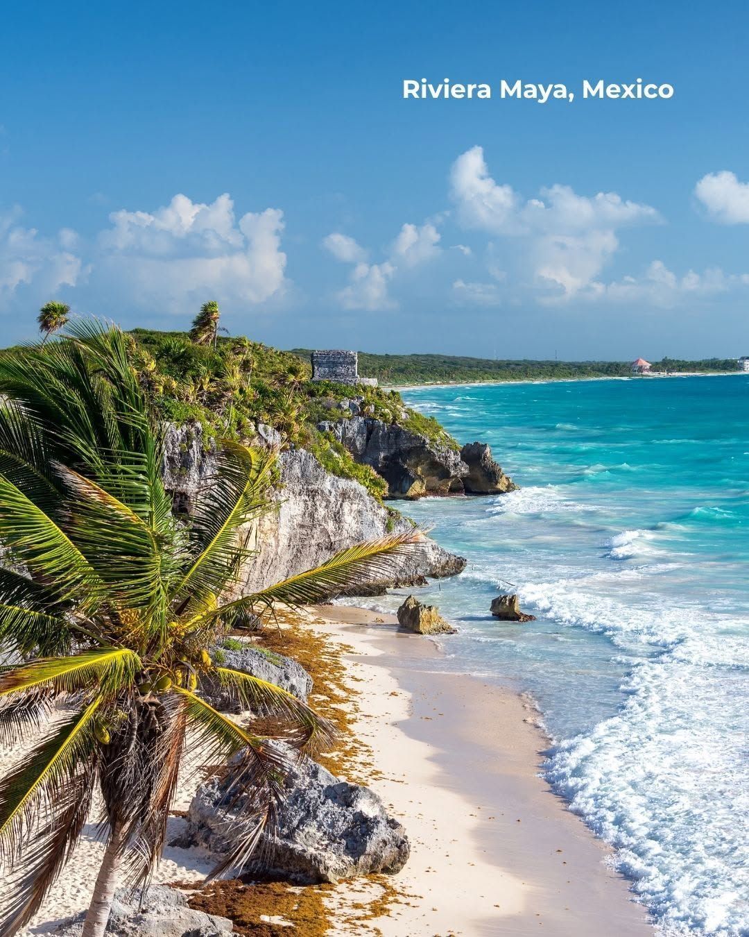Beachfront resort in Cancun Mexico with blue ocean and white sand